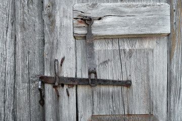 old wooden door texture  with metal lock