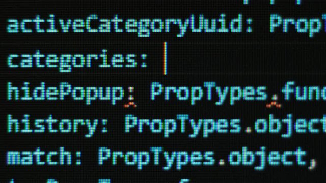 Javascript react computer programming code type close up detail pixel shot 4K macro on screen.