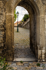 The walls of the historic city. Zizkov Gate, Historic houses in the center of Kutna Hora in the Czech Republic, Europe. UNESCO World Heritage Site.