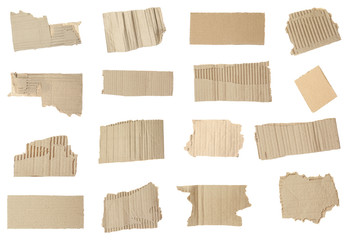 Set of torn cardboard pieces on white background