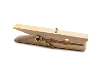 Wooden clothespins isolated on white background
