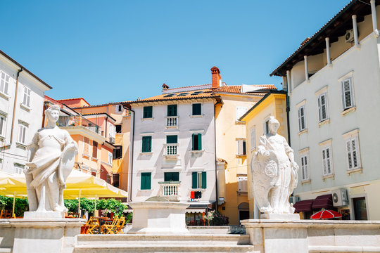 Old town Trg 1. maja square colorful buildings in Piran, Slovenia