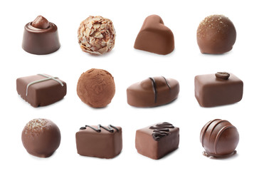 Set with different chocolate candies on white background