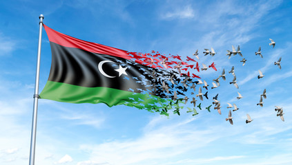 Libya flag on a pole turn to birds while waving against a blue sky background - 3D illustration.