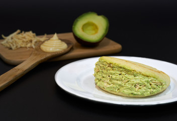 Venezuelan arepa queen pepiada with avocado and chicken typical food of venezuela