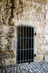 Fototapeta na wymiar Old, rusty door from Citadel of Namur, Wallonia, Belgium. Entrance in a castle.