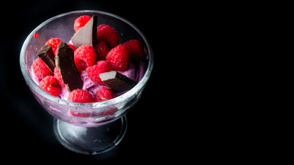 
Cup with raspberry ice cream and chocolate. Ready for entry.