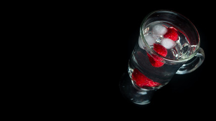 
Raspberry with ice in a water glass. Ready for entry.