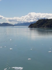Alaska glacier, lake, canal, mountains and snow with a clear blue sky on a sunny spring day 2018