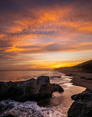 Obraz premium Coastline sunset on the beach
