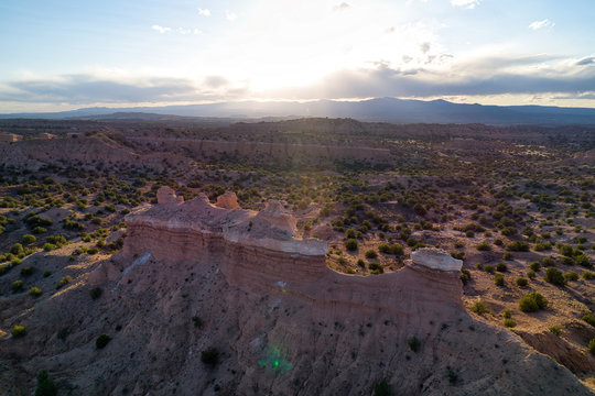 Sunset Aerial photograph of a New Mexico Landscape with Views of dramatic cliffs, mountains, and mesas