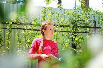 girl is reading a book