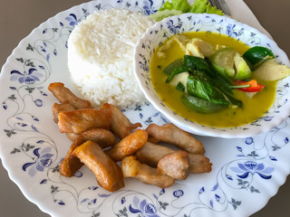 Fried pork rice and green curry with delicious Thai food