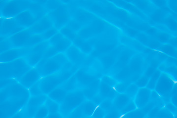 Blue water ripple reflection in the swimming pool