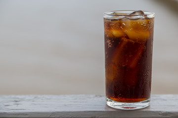 Cola with ice in the glass ready to drink for refresh