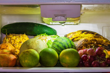 
different fruits of colors and flavors in refrigerator
