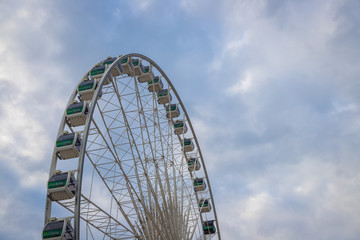 Ferris Wheel with blue sky on sunny day