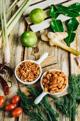 Roasted chili paste on a plate Taken with the assembly And vegetable side dishes Shot on a wooden floor backdrop