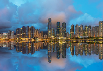 Panorama of skyline and Harbor of midtown of Hong Kong city at dusk