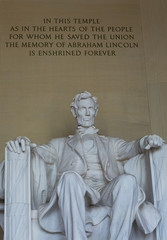 Washington DC, USA - 22 Dec 2019: Inside the Abraham Lincoln Memorial; Statue with Quote above