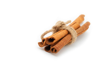 Top view cinnamon sticks isolated on white background.