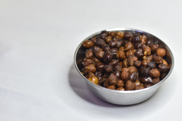 Indian traditional chana masala in a silver bowl on a white background, Indian Traditional Food  