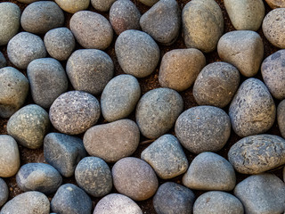 Mineral Background: Many round pebbles with different shapes and forms.