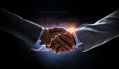 Partnership concept. Image of handshake