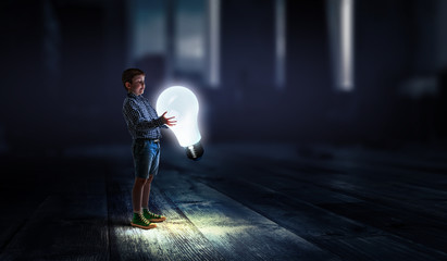Boy with a light bulb