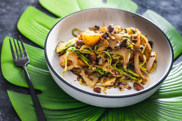 plant-based food, vegan lentil and potato bake with zucchini noodles