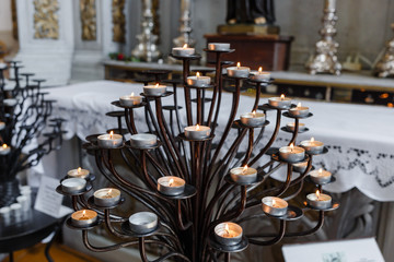Obraz na płótnie Canvas Small Candles in the temple