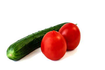 Isolated on white background cucumber and tomato