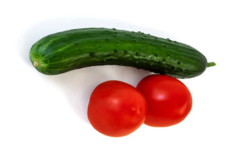Isolated on white background cucumber and tomato