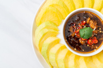 fresh mango with sweet fish sauce dipping