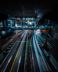 Fototapeta na wymiar 日本 東京 渋谷の道路を走る車とその光の軌跡
