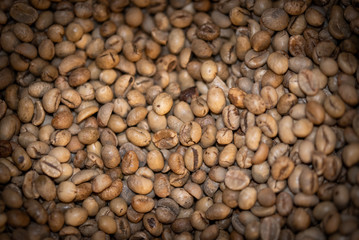 Natural coffee beans close up