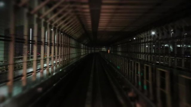 Nighttime timelapse about monorail ride in Tokyo