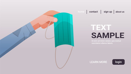 human hand holding medical mask coronavirus win defeated covid-19 celebrating victory over nCoV virus ending pandemic quarantine concept horizontal copy space vector illustration