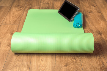 distance online yoga, yoga mat at home, on the wooden floor, Concept healthy lifestyle, sport