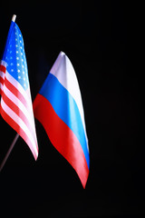 The concept of diplomatic relations. Flag of the Russian Federation and partner. Sanctions pressure...