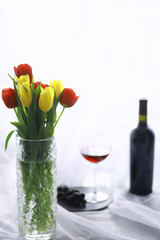 Glass with grape red semi-dry wine. Valentine's day concept background. Gift for the holiday. Sweet sparkling wine.