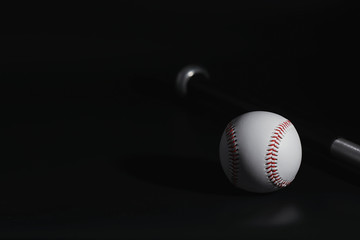 American traditional sports game. Baseball. Concept. Baseball ball and bats on a black table.