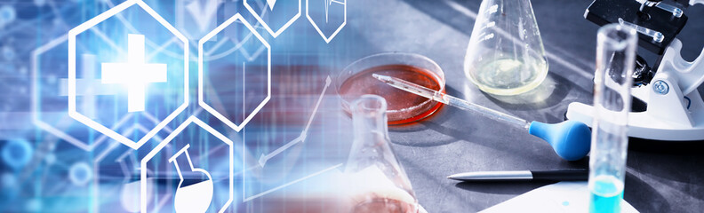 Laboratory research. Drug testing. Chemical experiments in the laboratory. Microscope various test tubes and beakers on the table at the medical officer.