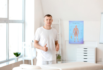Portrait of massage therapist in medical center