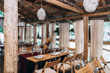 Banquet table setting and decoration. Cutlery on the table.