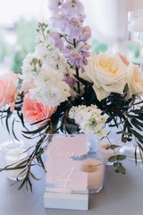 Wedding flowers on the banquet table. Table decoration.