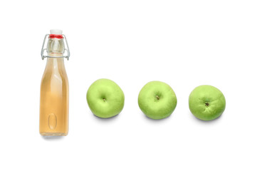 Composition with fresh apple cider on light background