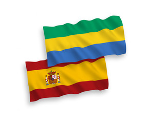 Flags of Gabon and Spain on a white background