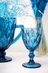 set of blue glassware on a white background
