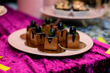 Candy bar. Table with sweets, candies, dessert. Chocolate mousse.
